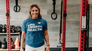 Fit woman standing in a gym
